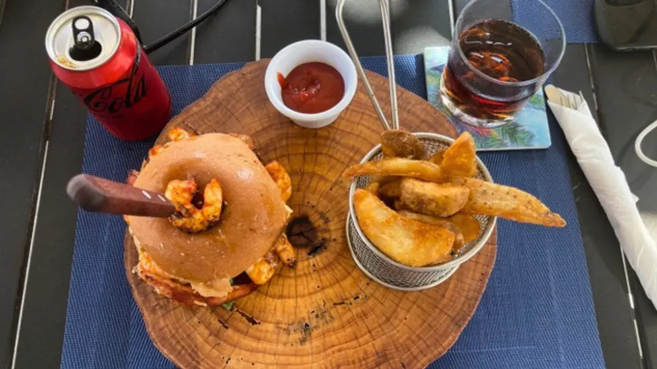 Shrimp burger with bacon and pineapple at Las Palmas Hotel.